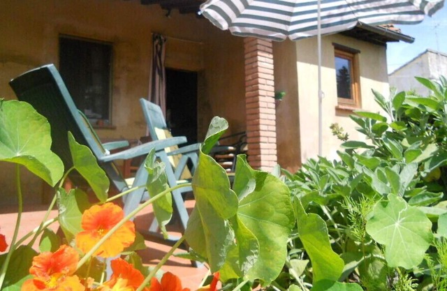 Romantic holiday house with enclosed garden in an enchanting village,
