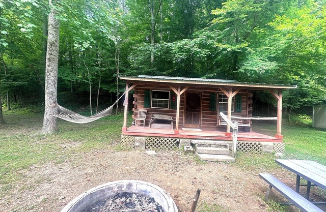 Rustic cabin in Nashville, Indiana offering a cozy camping experience