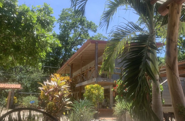 Rustic jungle lodge in a tranquil garden setting - Room 6 Family room