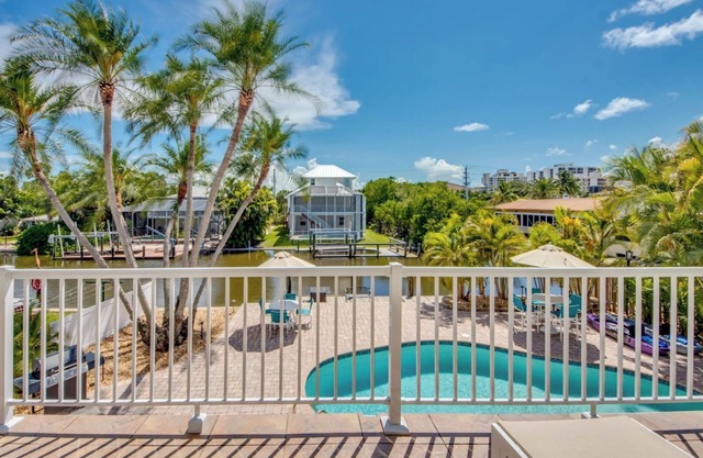 Sand Dollar #3 - Upstairs Apt with Shared Pool on Canal by the Beach!