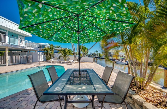 Sand Dollar #4 - Upstairs Apt with shared Pool on Canal by the Beach!