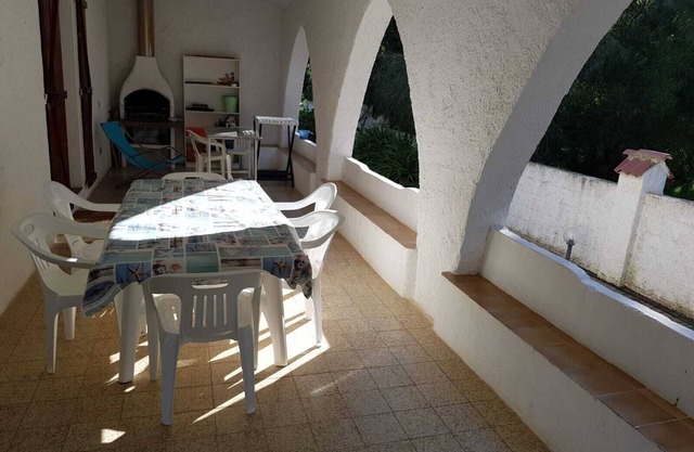 Sardinia 50 M. sandy beach Torre delle stelle,, villa surrounded by greenery
