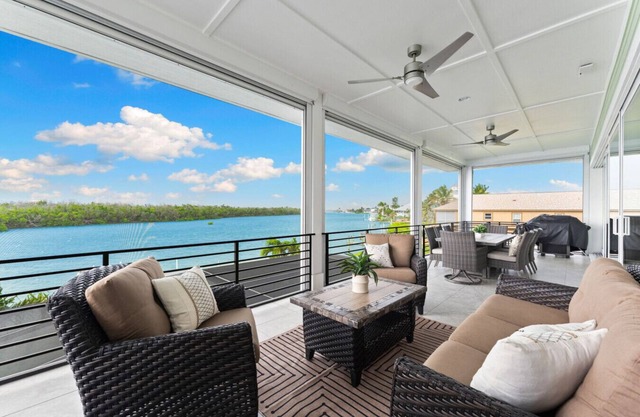 Seafoam Serenity - Bayfront Retreat w/Dock, Pool & 1 Min Walk to Bonita Beach