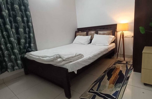 secured gated community 2-bedroom apartment with AC, fitness room, swimming pool