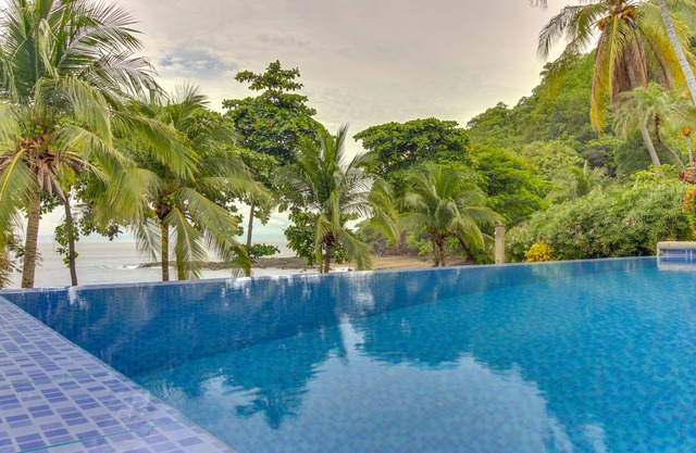 Sensational ocean view resort villas BBQ area, shared pool and beach access