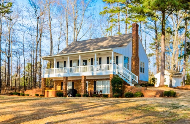 Serene Lakefront Escape with Sunset Views, Private Boathouse, and Endless Fun!