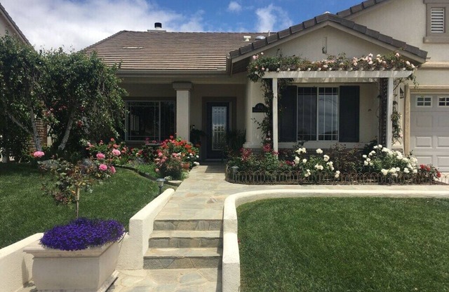 Single story house with private pool, jacuzzi and outdoor fireplace.