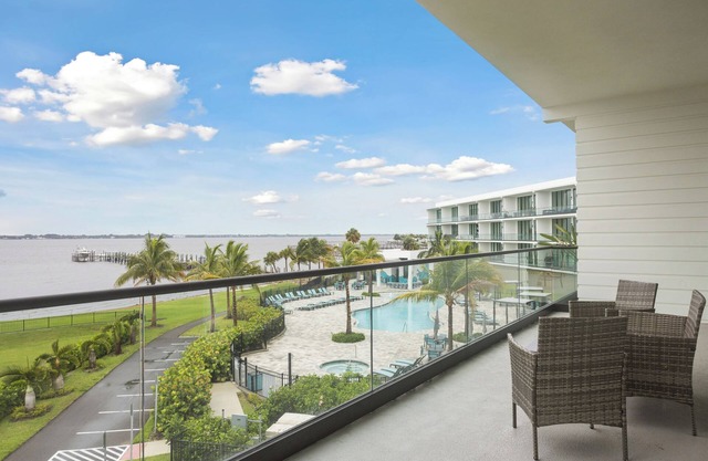 Sleek Coastal Condo with Stunning Riverfront Views and Luxury Amenities