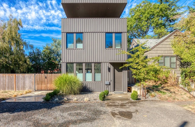 Sleek, modern home with enclosed yard, balcony, patio, WiFi, AC, & W/D