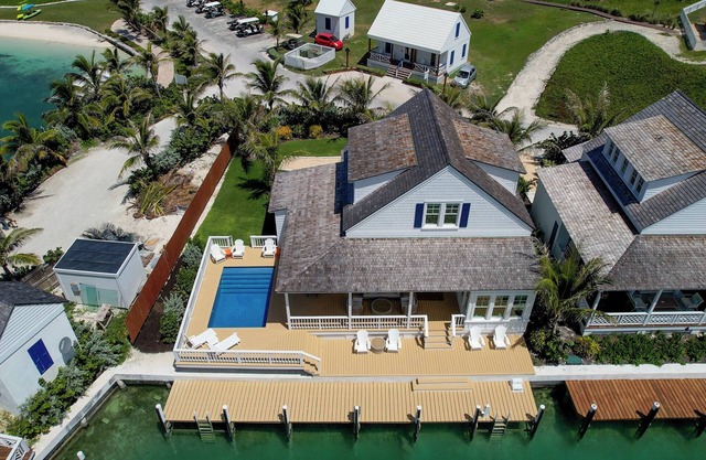 South End Villa on the water: lovely pool, expansive decks, and 60’ private dock