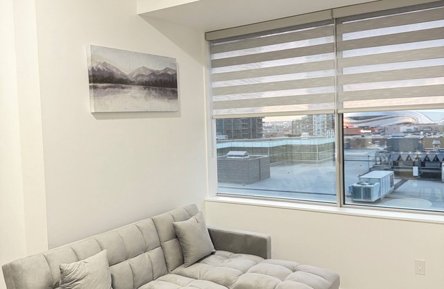 Spacious 1 Bedroom with City Views by Rogers