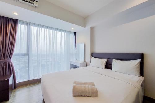 Spacious 2BR at Branz BSD City Apartment By Travelio