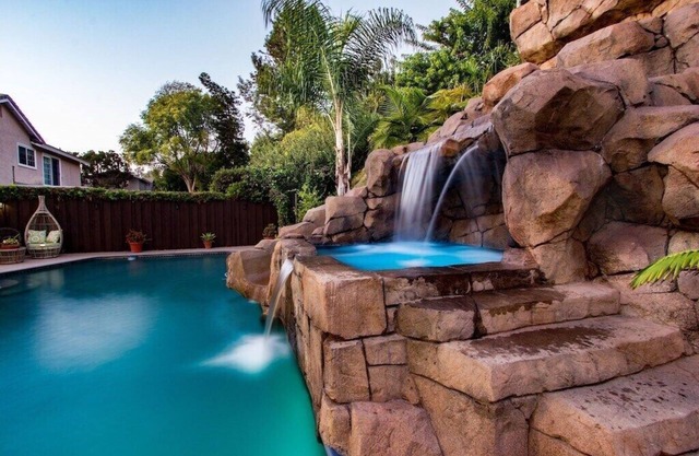 Spacious 6 Bedroom Vacation Home with Waterslide & Heated Saltwater Pool