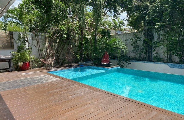 Spacious 7-bedroom villa in Playa del Carmen with private infinity pool.