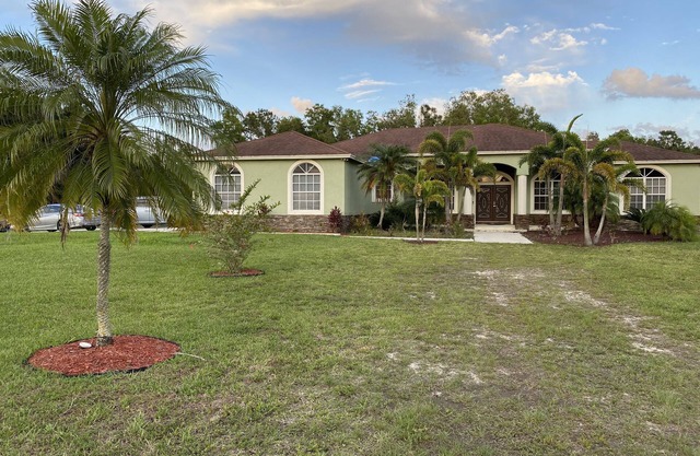 Spacious Acreage Getaway with private pool and basketball court