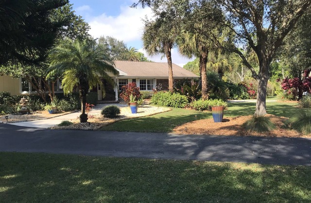Spacious Custom Home on fully landscaped large lot. Hot tub, gazebos, etc.