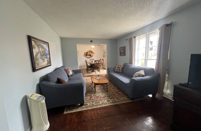 Spacious family home with enclosed yard, patio, and modern kitchen appliances