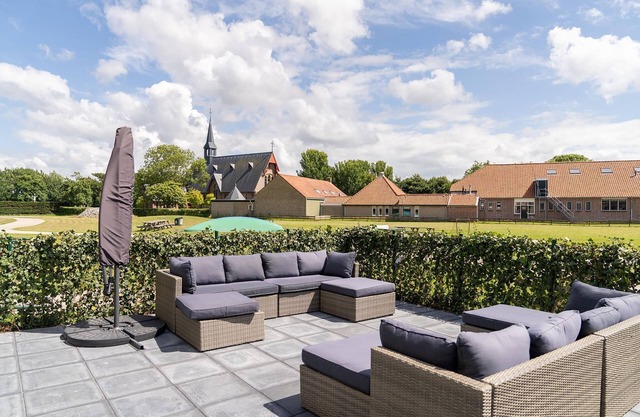 Spacious holiday home in Nes with garden