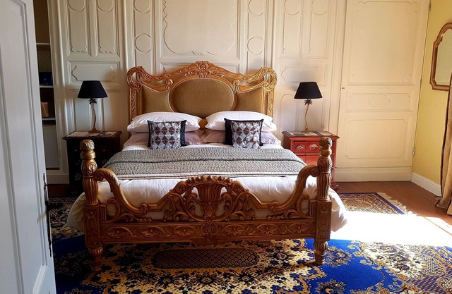 Spacious luxury Studio Room with king-size bed, and freestanding bath