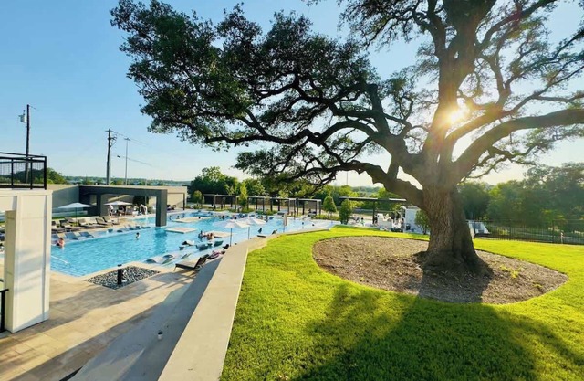 Spacious Retreat Near Domain | 2BR, Pool & Gym