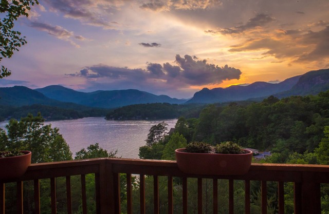 Spectacular views from modern lake front home with boathouse & pontoon available