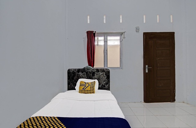 SPOT ON 91699 Homestay Hj Lela Syariah