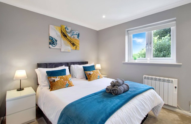 Spotless Two-Bedroom Home with Garden and Parking