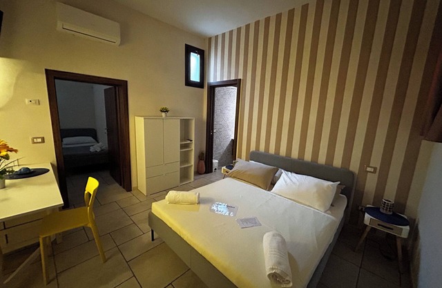 Standard Room for 1-4 Guests – Comfortable Stay in Pulsano Historic Center