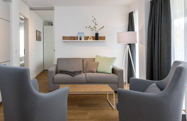 Strandnahes Apartment mit Balkon Inkl. Parkplatz, Schwimmbad- & Saunanutzung