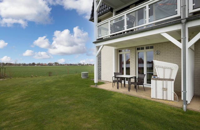 Strandnahe, Familienfreundliche Ferienwohnung mit Sauna, Terrasse und Strandkorb