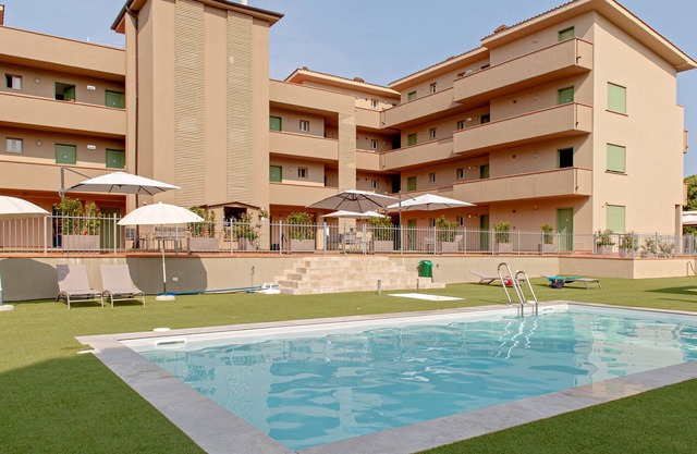 Studio Apartment "Res San Francesco 6" with Shared Pool, Private Garden & Wi-Fi