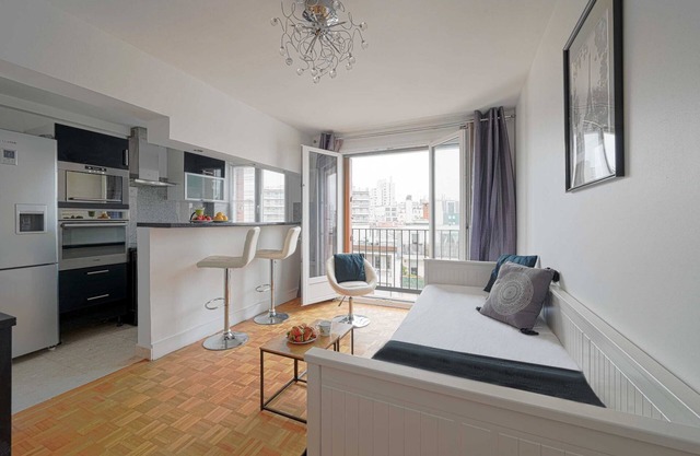 Studio avec vue sur les toits