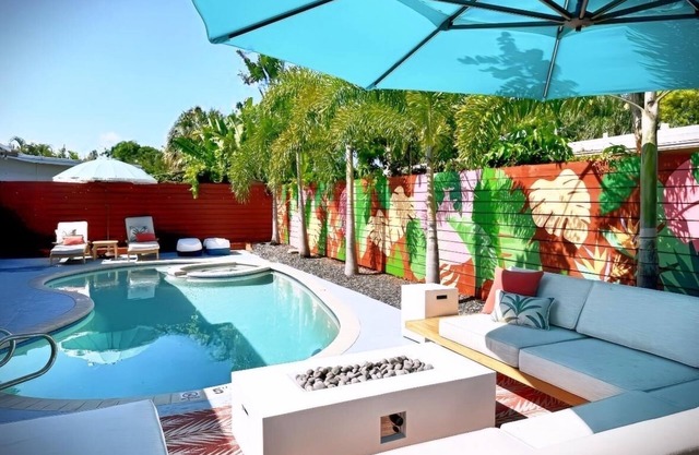 Stunning Poolside Retreat - Half Mile- Short Walk to Beach, Shops & Dining!