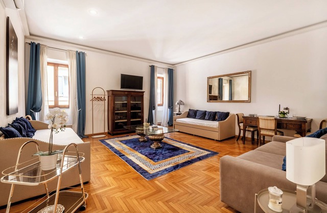 Stylish 2-Bedroom Apartment with Terrace & Stunning View Near Trevi Fountain