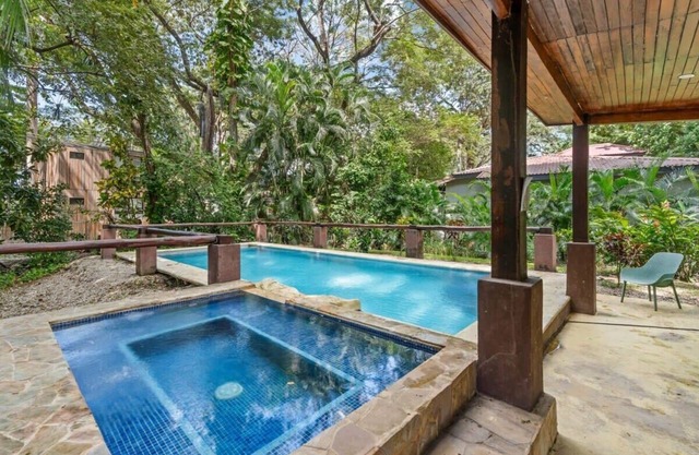 Stylish 3-Bedroom Tropical Escape with Pool & Outdoor Living, 1 Block from Playa