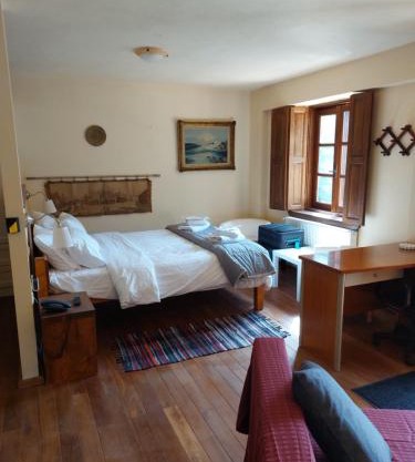 Suite Korfes-Κορφές Αυτόνομη Σουίτα με Τζάκι στην Βίλα Κορφές