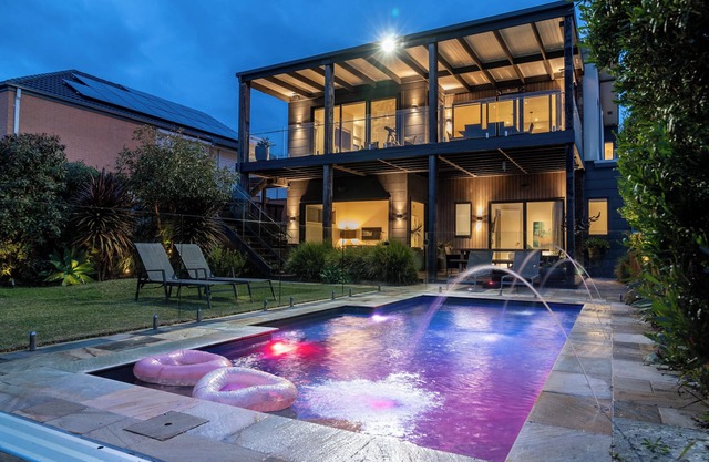 Summer-Ready Retreat: Sparkling Bay Views, Heated Pool, Fire Pit & Games
