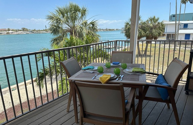 Sunset Beach Waterfront Elegance, steps from beach and dining