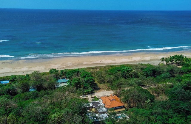 Super lux 5-bedroom, 7 bath house in beautiful Playa Grande with golf cart!
