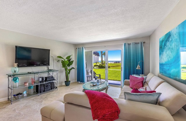 Surfside 112: Ground-Level with Ocean View Patio, Steps to Pool & Beach