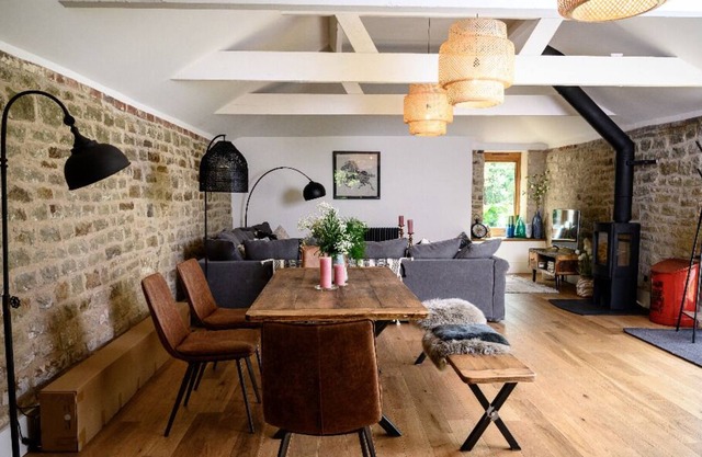 Sussex barn with games room, hot tub and natural swimming pond.