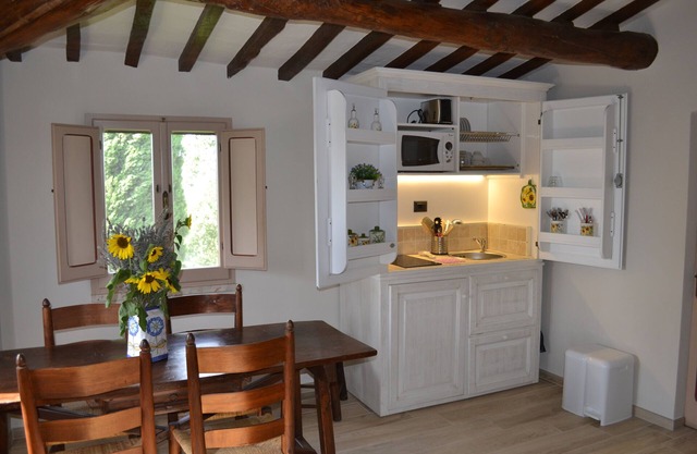 Terrace on the Lake. House nestled in the green hills between Umbria and Tuscany.
