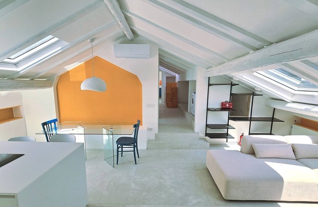 The Attic Room on Niella Street, in the city center and near the sea