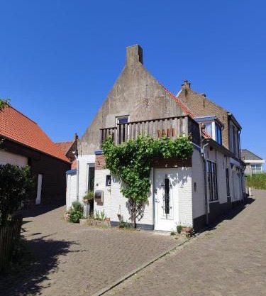 The cosy little house with the sundial