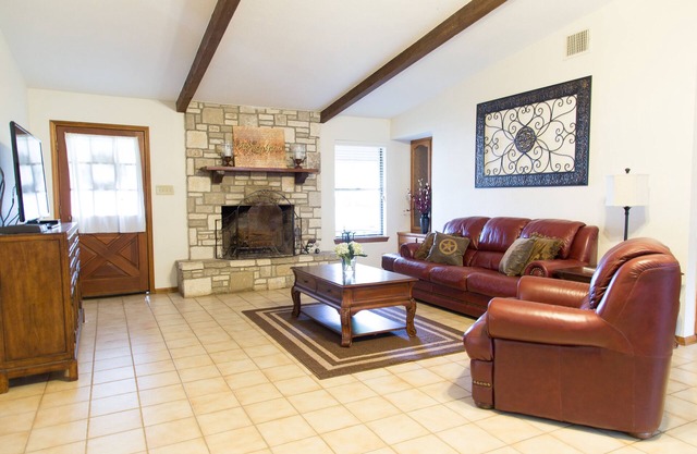 The house is in the middle of town, next to HEB with an amazing backyard.