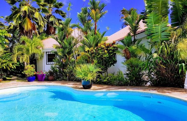 The hummingbird patio, original villa by the sea