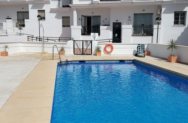 This apartment is in the centre of the village and has a south facing balcony.