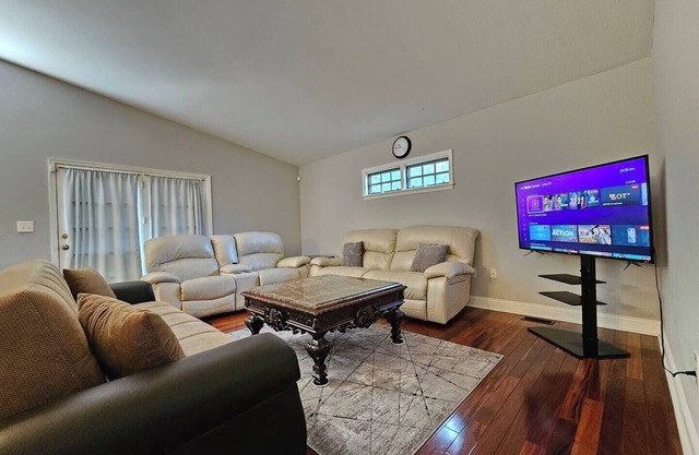 This charming two-level home offers the perfect mix of space and convenience