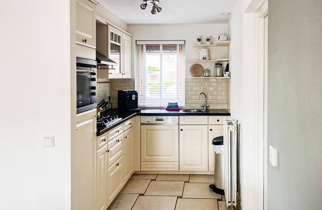 This luxury waterfront vacation home is located in a cottage area and close to a boat rental.