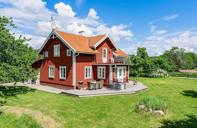 This modern cottage awaits your visit in a beautiful area, close to Kolmården Animal Park and not fa